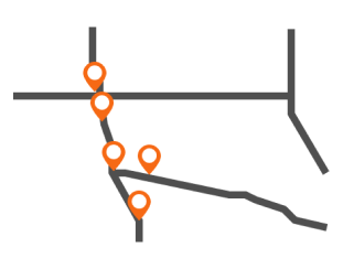 Simple map illustration with orange location pins along intersecting lines.