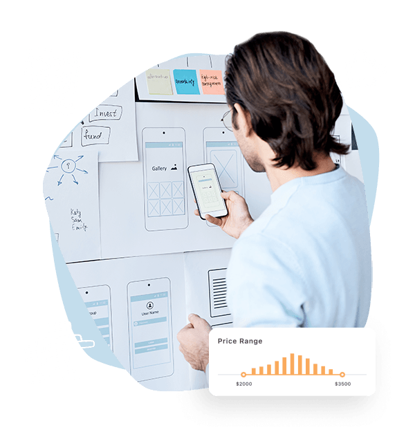 Man working on mobile application wireframes